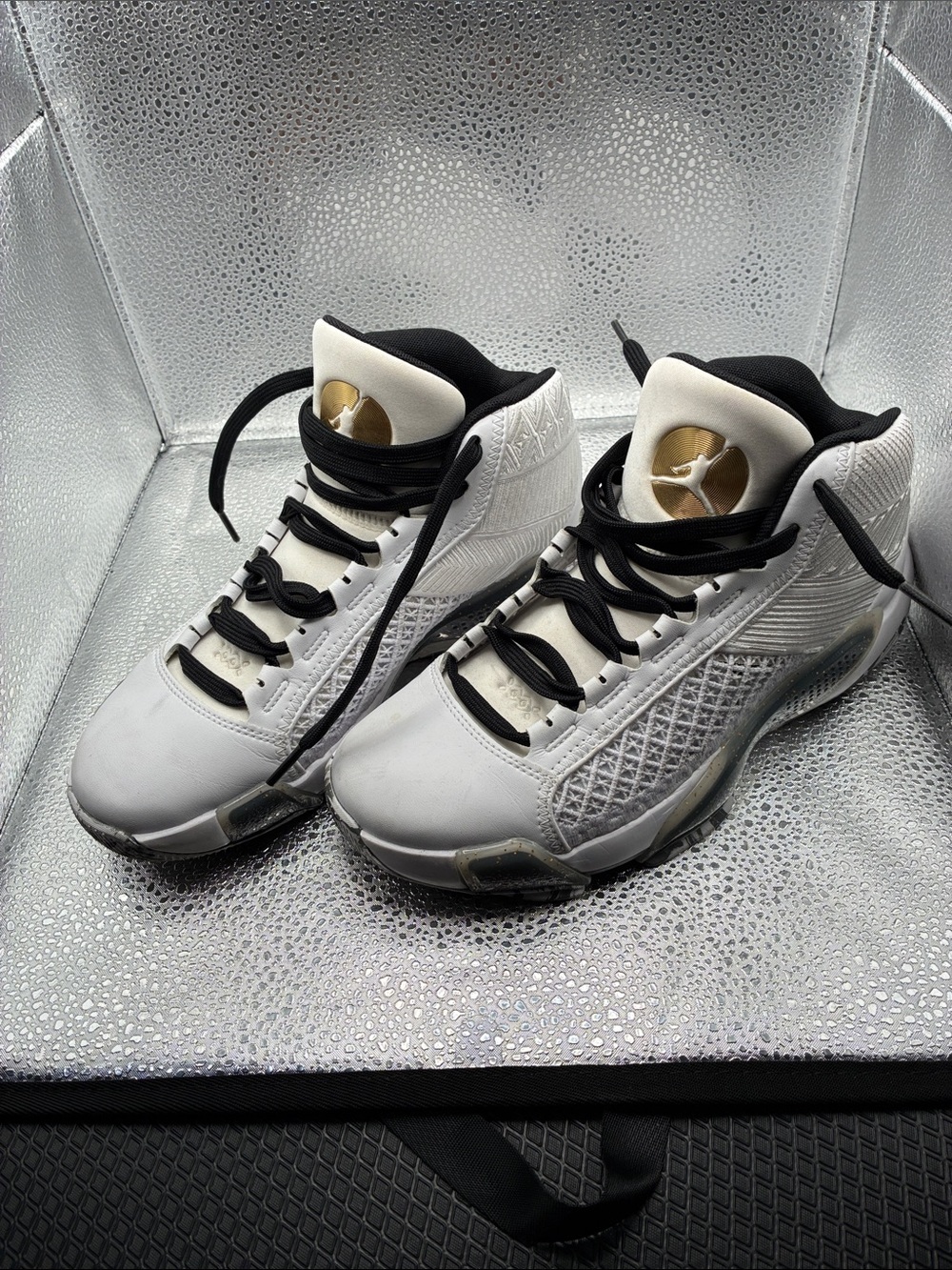 Jordan Kids White and Black High-Top Sneakers with Gold Accents